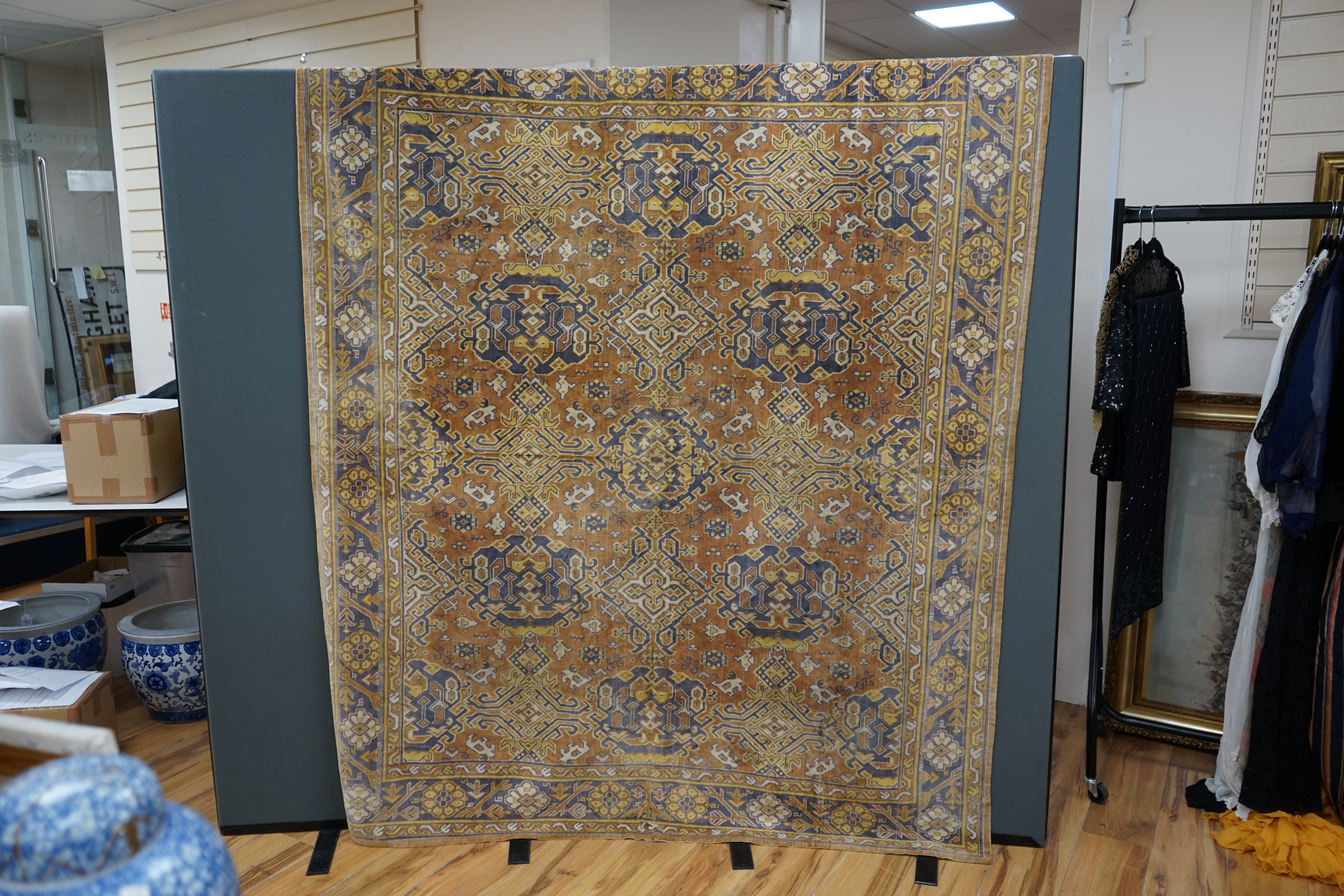 An Edwardian table cover in brightly coloured wools, with a floral design, together with a later 20th century continental grey, beige and cream patterned silk cover, Edwardian table cover 220cm x 172cm. Condition - colou